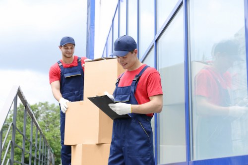 Loading furniture into a van for a local move in Bow