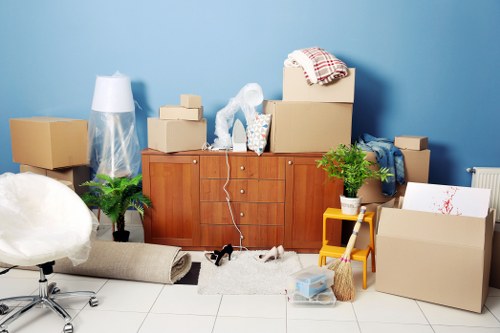 Movers loading a van for a local move in Bow