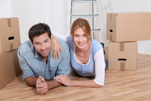 Professional movers handling furniture in Bow area