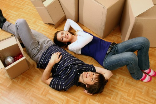 Careful packing and lifting during a home move in Bow